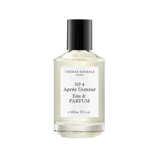 Botella elegante de apres l amour de Thomas Kosmala Paris, con un diseño minimalista en blanco y un tapón negro, destacando la sofisticada.