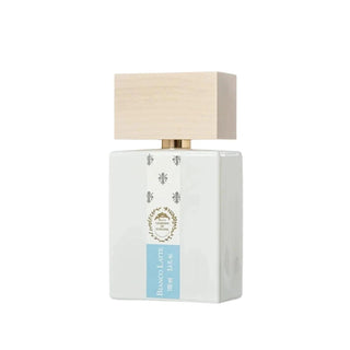 Botella de perfume Bianco Latte de Giardini di Toscana EDP 100 ml, fragancia gourmand unisex con notas de vainilla, caramelo y miel, en un elegante frasco blanco con detalles dorados.