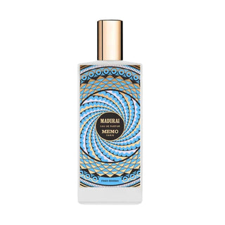 Botella elegante de Madurai Memo Paris, con un diseño hipnótico de patrones azules en espiral, un tapón dorado y la esencia floral