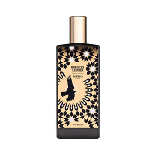 Botella elegante del perfume Moroccan Leather de Memo Paris, con un diseño sofisticado que incluye una silueta de águila negra, patrones geométricos intrincados y un tapón dorado de lujo.