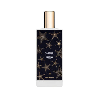 Botella sofisticada de Vaadhoo Memo Paris Unisex EDP, con un diseño de estrellas marinas doradas sobre fondo negro.